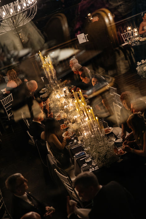 reception dinner with candle lit tables