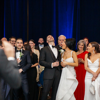 Bride and groom celebrating with guests at Aspire NYC wedding reception