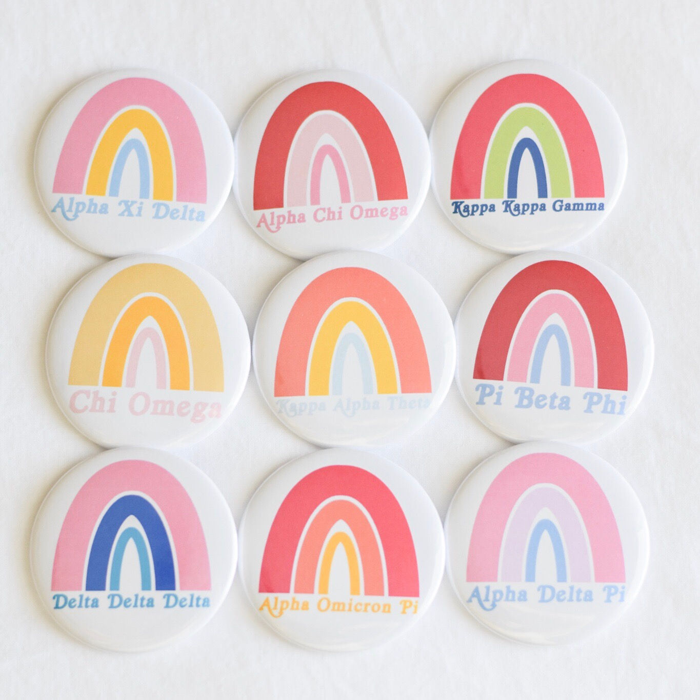 greek rainbow button