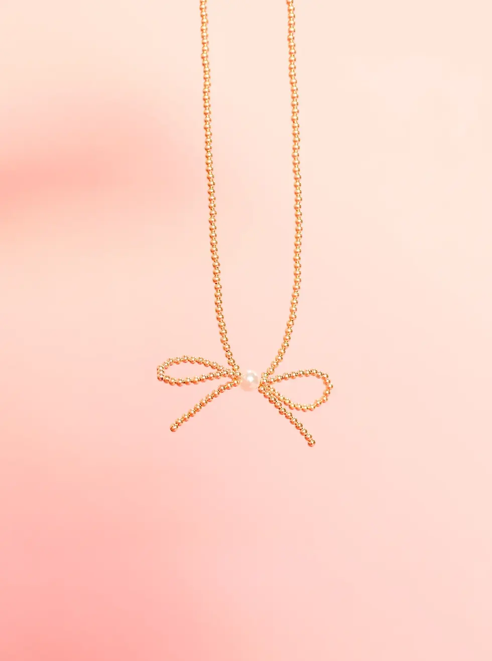 Thumbnail: BB Gold Bow Necklace