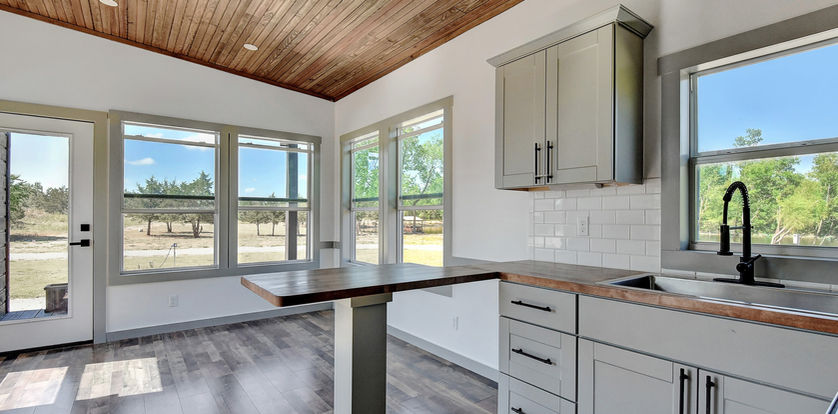 Admiral View into the Living Room from Kitchen Windows and front door.jpg