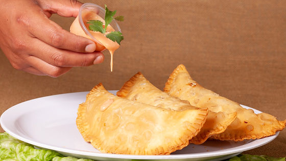 2 Beef Empanadas W/ Fountain Coke!