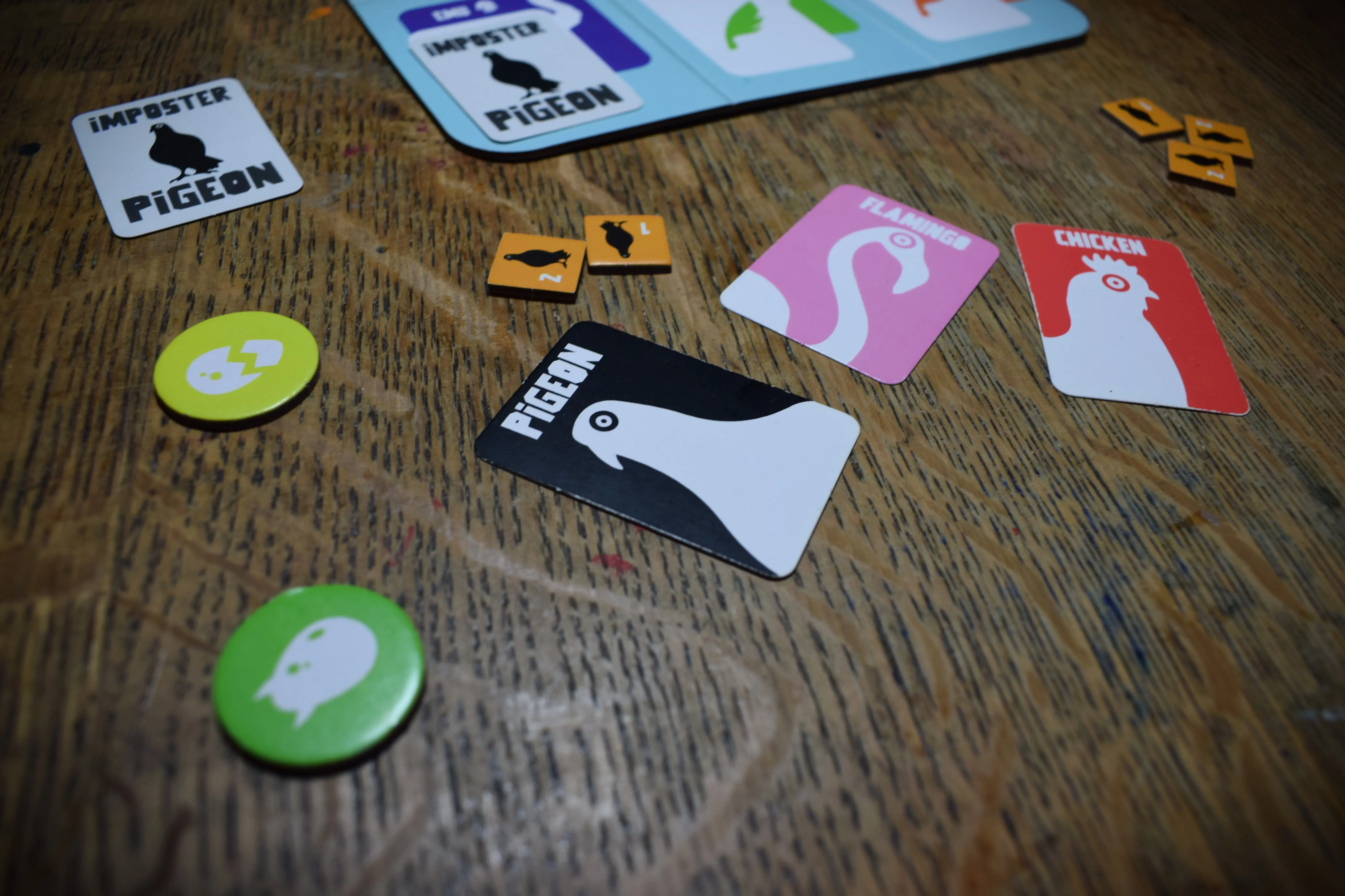 pucks, points, and cards from IMPOSTER PIGEON