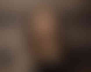 Portrait of a woman relaxed in her own space.