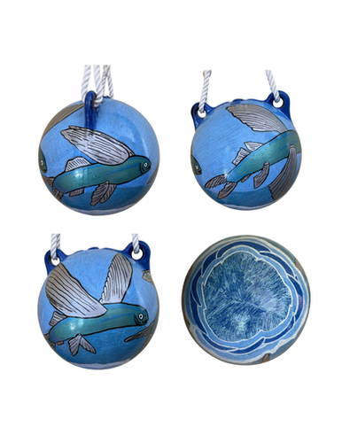 Image of a flying fish painted on a buoy, a design created for Brave Heart Volunteers' annual buoy fundraiser.