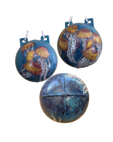 Image of jellyfish painted on a buoy, a design created for Brave Heart Volunteers' annual buoy fundraiser.