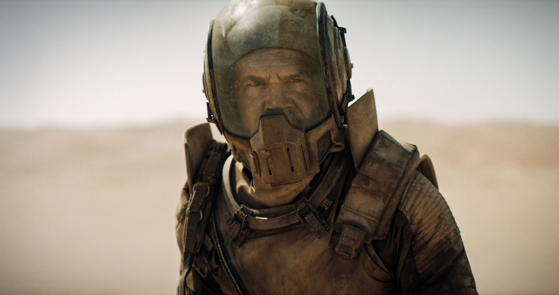 a man in a spacesuit that looks industrial with a helmet with a visor