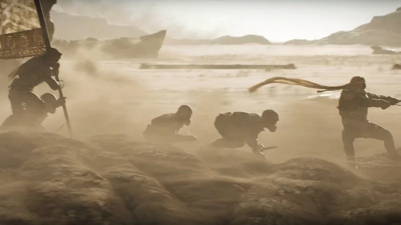 four men surfing on a giant sandworm