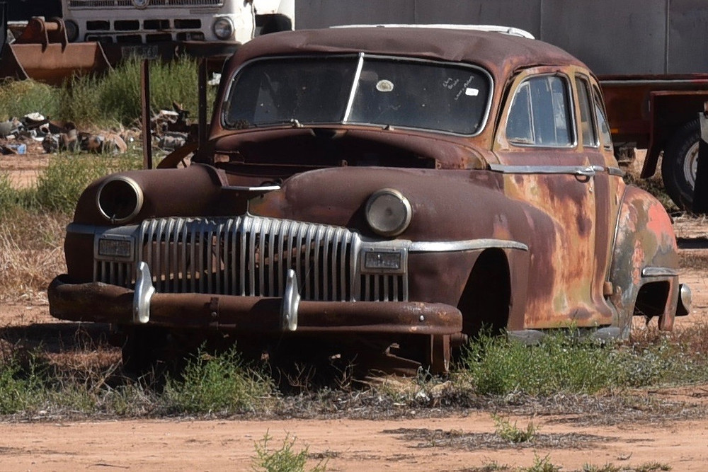 Rusted old sedan