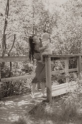 Mom and baby on bridge