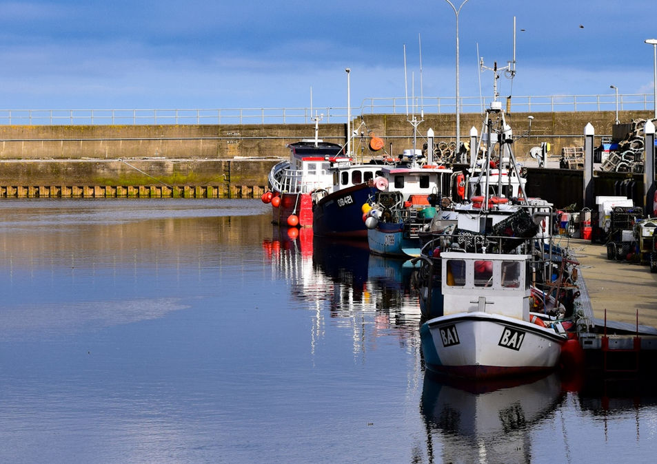 Herring fishing boats safely moored in Helmsdale Harbour, Highlands, Scotland. Copyright, Melanie Le Sage Photography