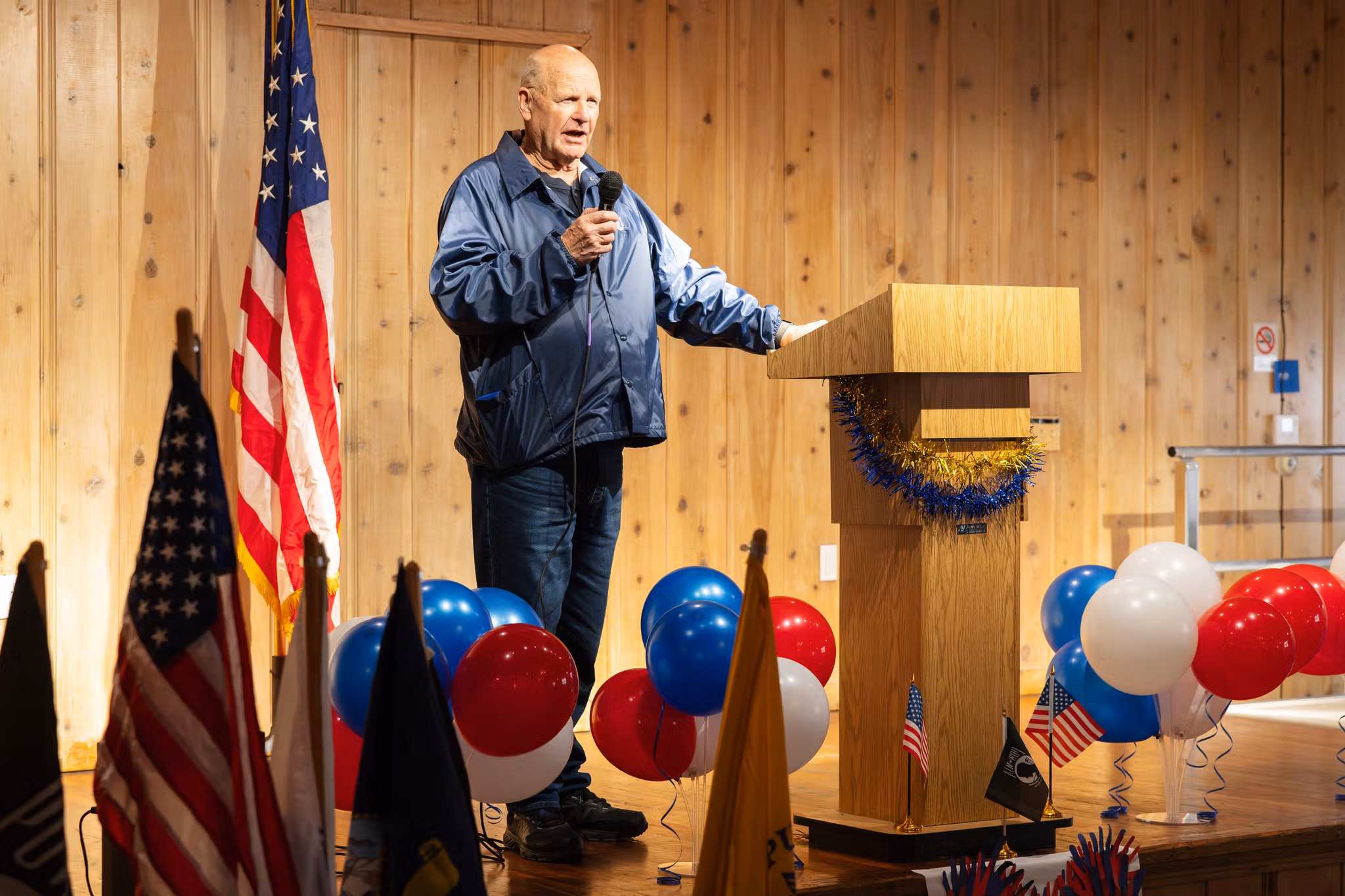 Veterans carried the flags of the United States and branches of its military