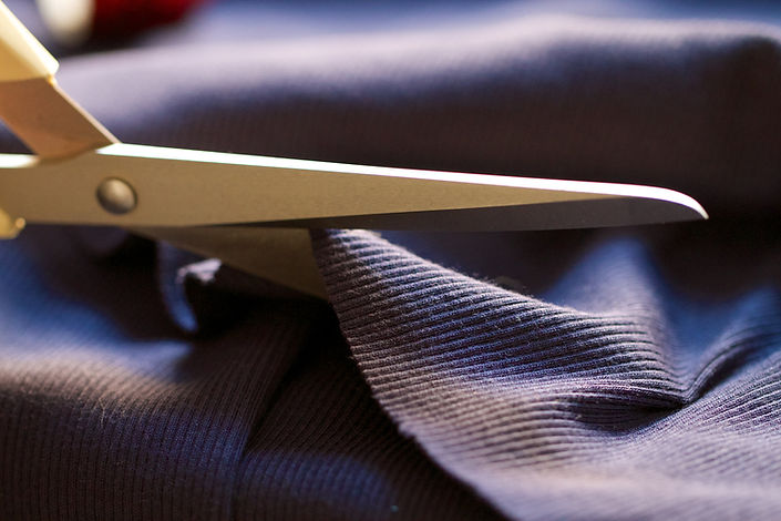 Scissors Cutting Fabric