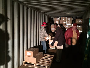 Workers loading truck.jpeg