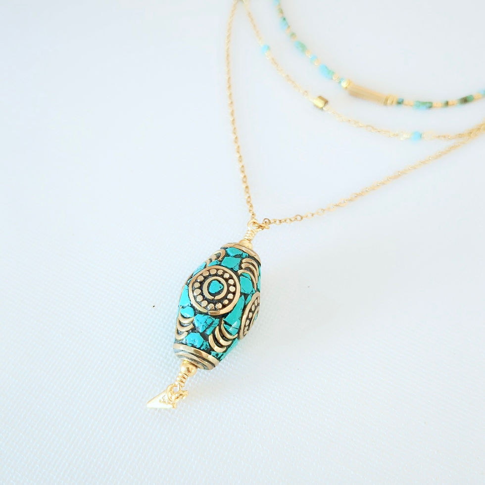 Miniatura: Collier ISALYS multirangs bohème chic, perle ovale turquoise ethnique, fines chaînes et détails dorés.