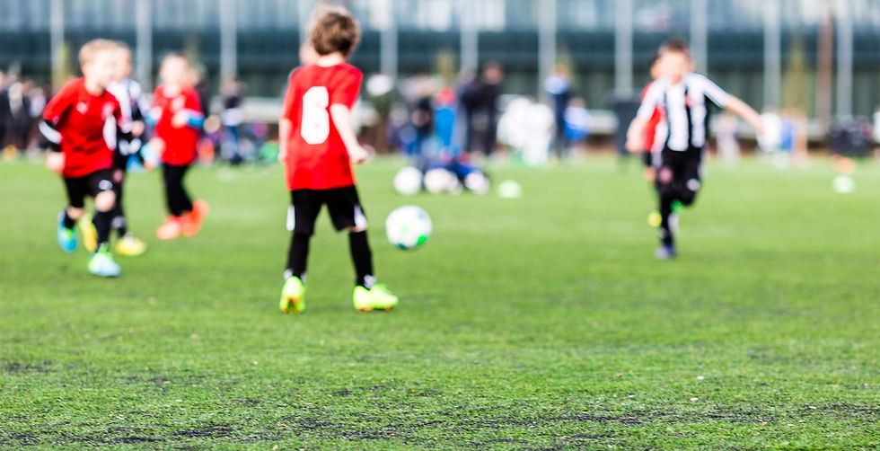 young-kids-playing-soccer-e1457622910853