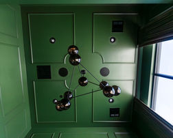 Green color drenched accent ceiling