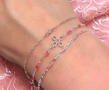 Sterling silver stack bracelet with pink beaded chain and charms