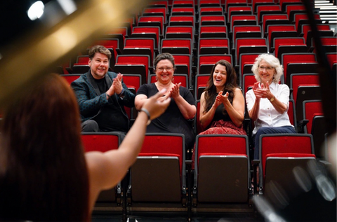 OperaWorks audience applauding after live opera performance