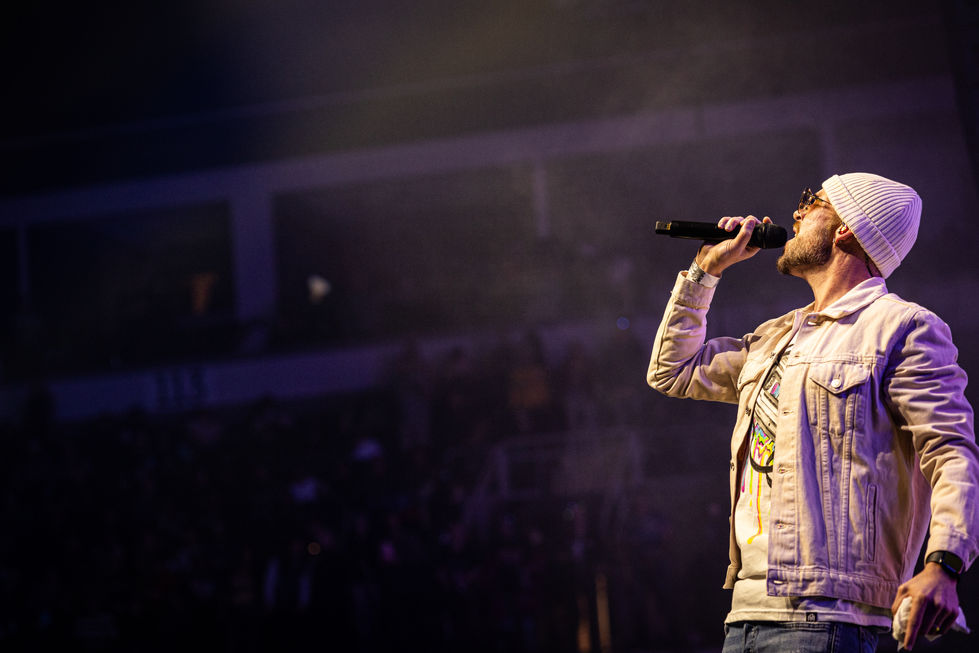 Collie Buddz energizing the audience at Lake Tahoe Winter Reggae Festival 2024, photographed by TJL Brand Enhancement.
