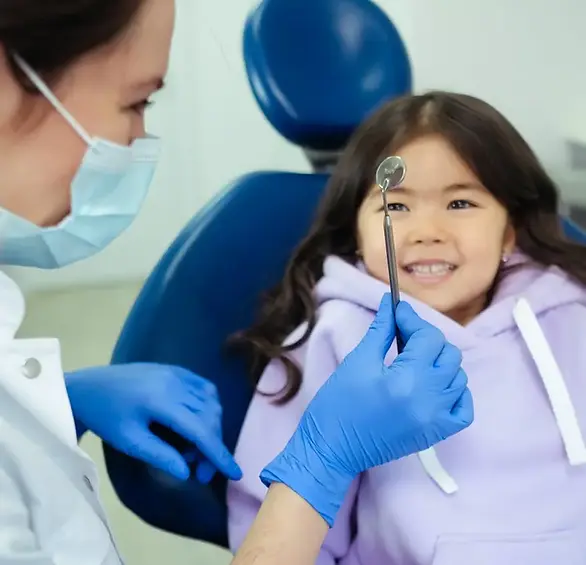 a girl happy to visit the dentist