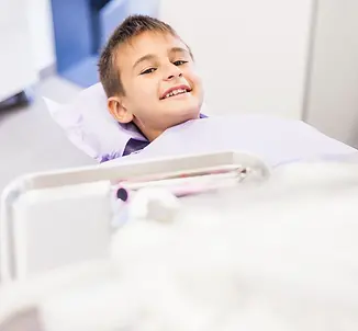 Child comfortable during emergency dental for kids