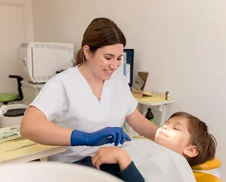 3. Child relaxed during white spots on teeth treatment.webp