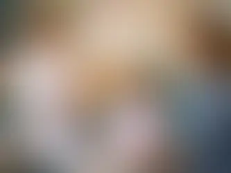 Child sitting in pediatric dental chair during tooth extraction consultation