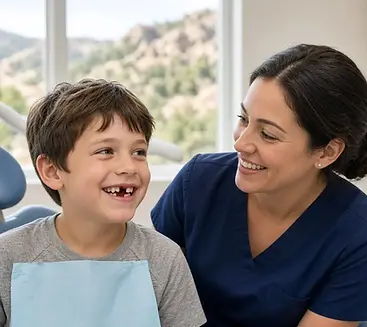 Boy showing a lost baby tooth