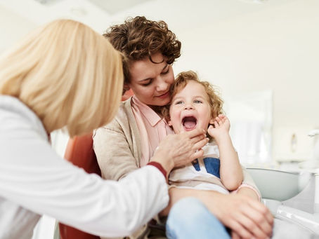 Child patient having oral health examination