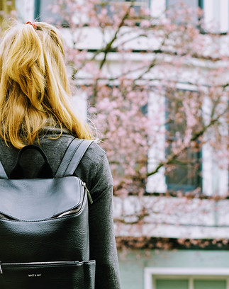 Student Looking at Building