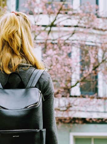 Student Looking at Building
