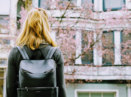Student Looking at Building