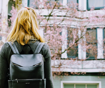 Student Looking at Building