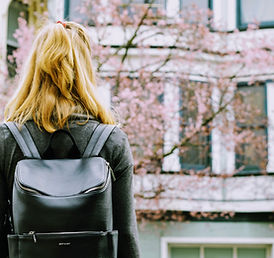 Student Looking at Building