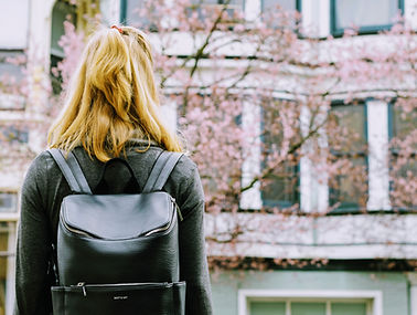 Student Looking at Building