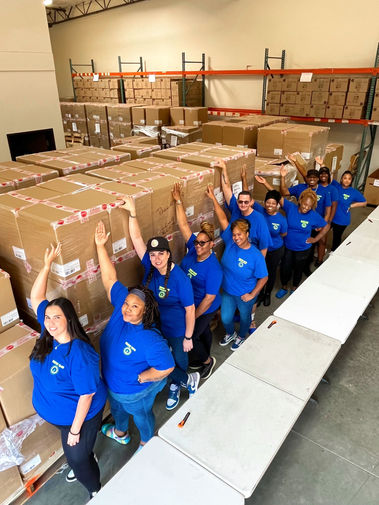 Volunteers with boxes