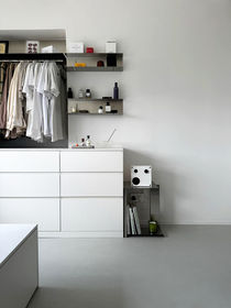 Minimalist Closet Space with Chalk Grey Mono Tile Vinyl Flooring