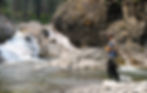 A fisherman's rod bends under the weight of his catch as he reels in the fish in Alberta SouthWest.