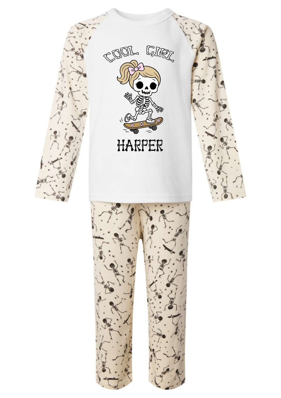 Child's Halloween pyjamas with a skeleton design and child's name printed on them.