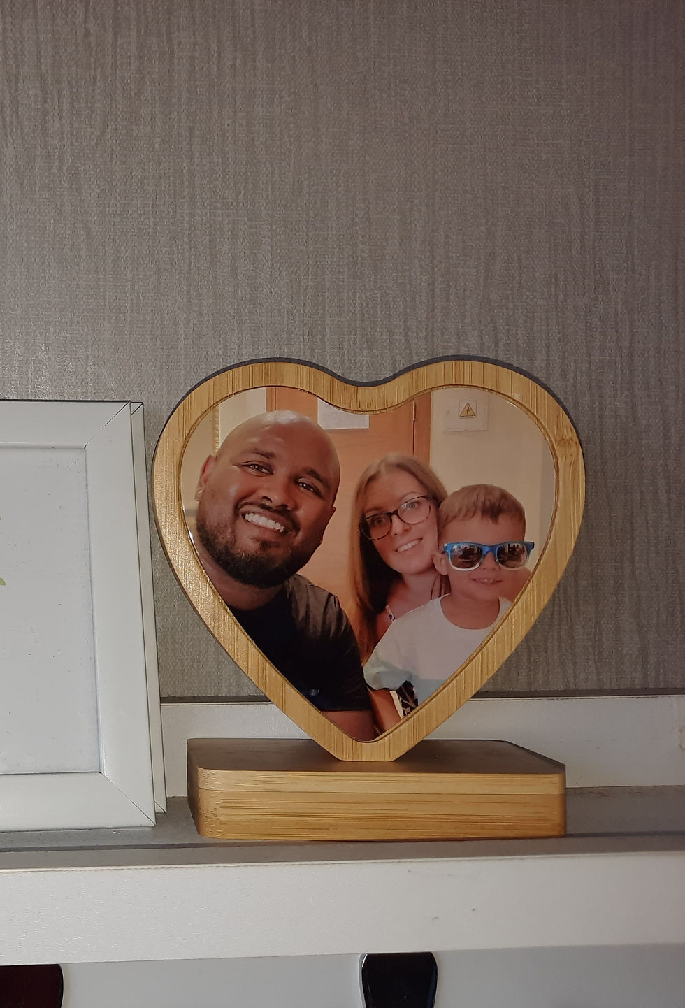 Bamboo shapes heart with a custom photo on