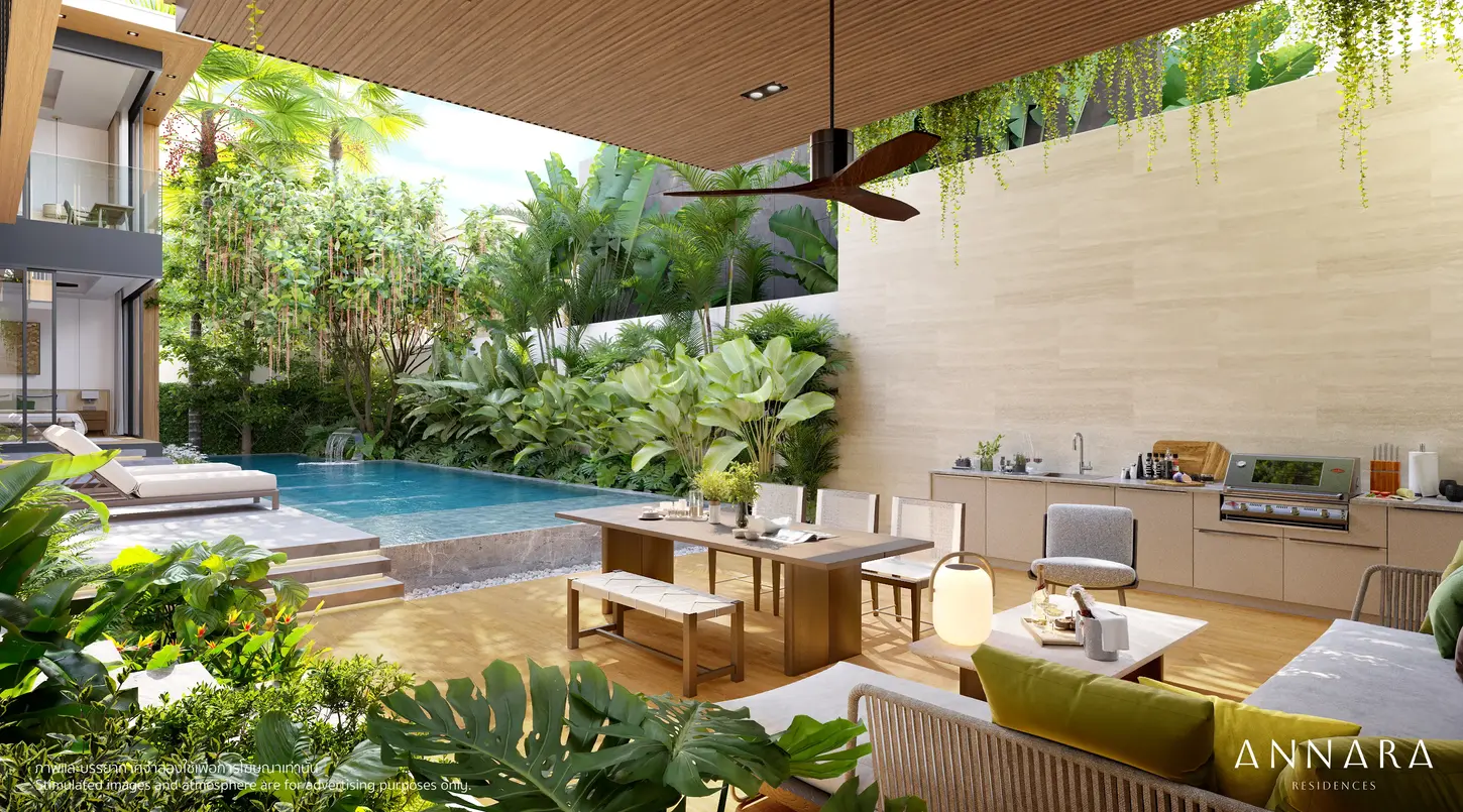 Annara Residences Best Phuket home Outdoor living and dining terrace beside a pool, surrounded by tropical plants and wood