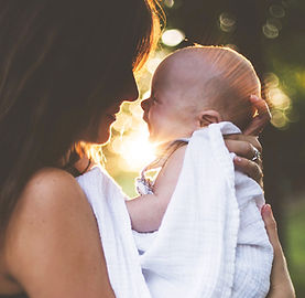Mother Holding Baby Postpartum