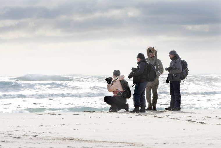 Kattuk guests observing the winter coastline on Sable Island