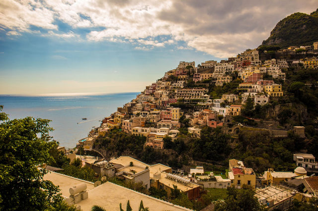 A stunning view of Positano village perched on cliffs along the Amalfi Coast, Italy.
