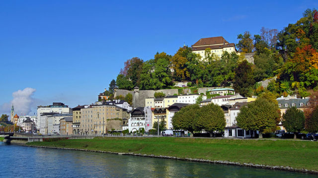 Riverside view of Salzburg, Austria on a sunny autumn day.