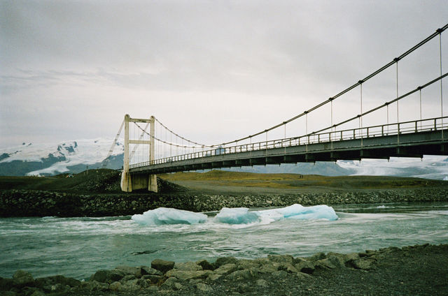 a suspension bridge over a body of water