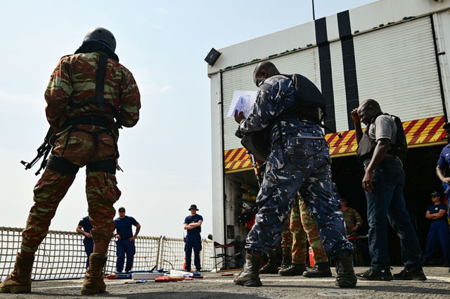 Coast Guardsmen and members of the Benin Navy conduct law enforcement training aboard USCGC Spencer (WMEC 905) as part of Obangame Express 23 in the Atlantic Ocean, Jan. 30, 2023.