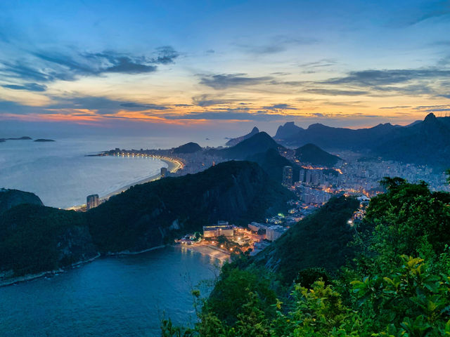 aerial photography of mountains surrounded by sea