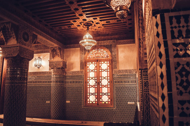 Stunning Moroccan interior showcasing intricate mosaics and Moorish craftsmanship in Fes.